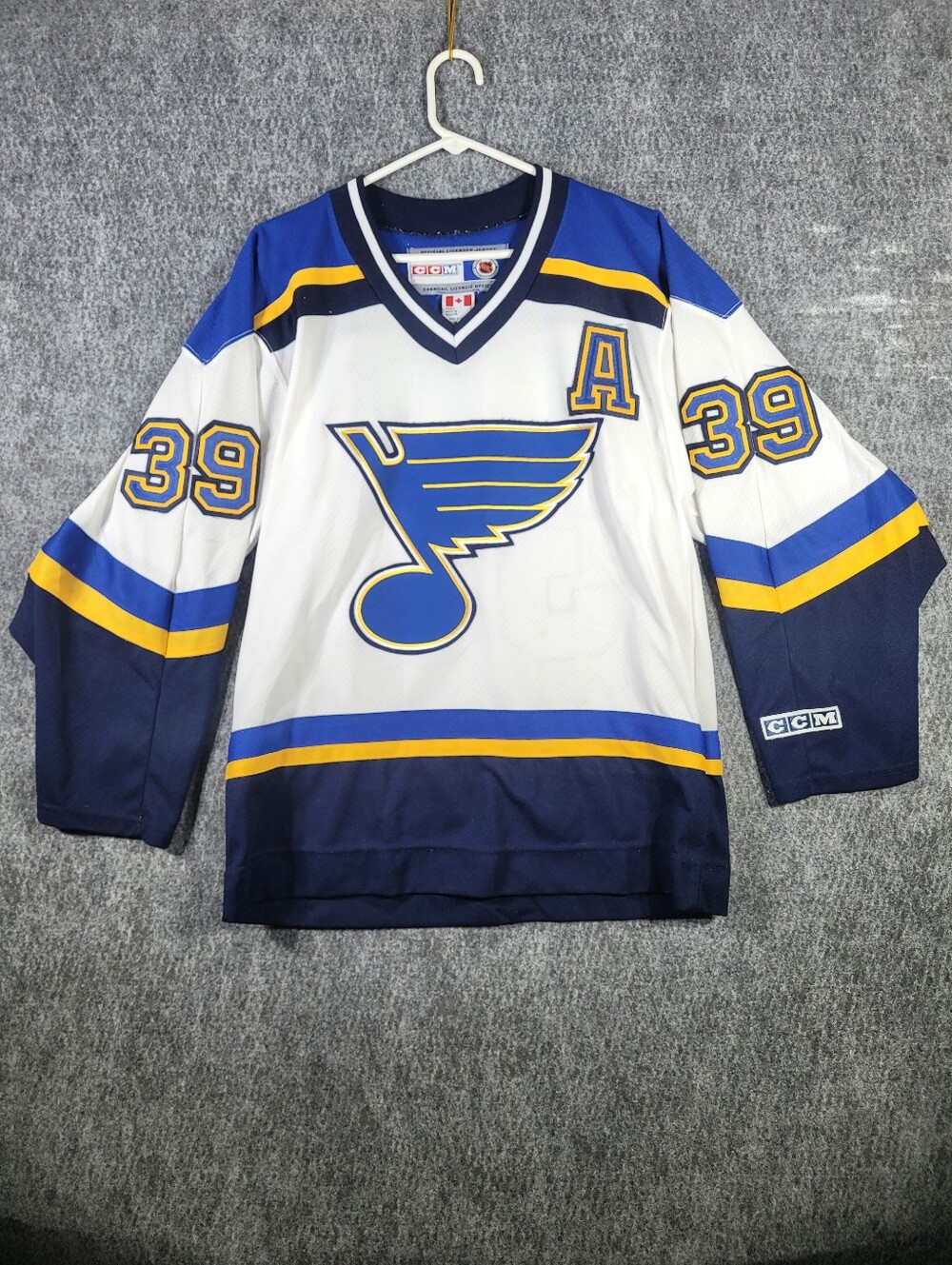 CCM White and Blue NHL Licensed Hockey Jersey Collar Tag Detail